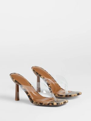 Lady In Leopard Thong Stiletto Mules