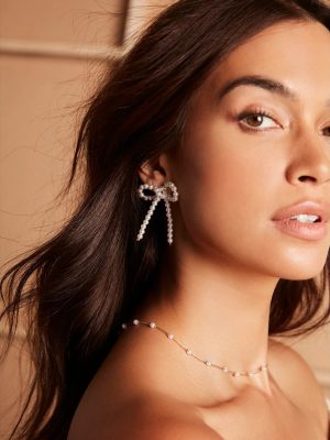 Upscale Chic Faux Pearl Bow Earrings